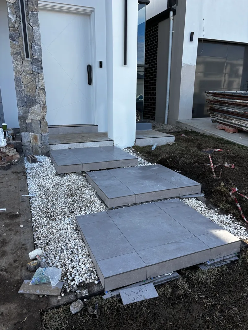 Floating entry stairs in Marsden Park after the completed tiling work.