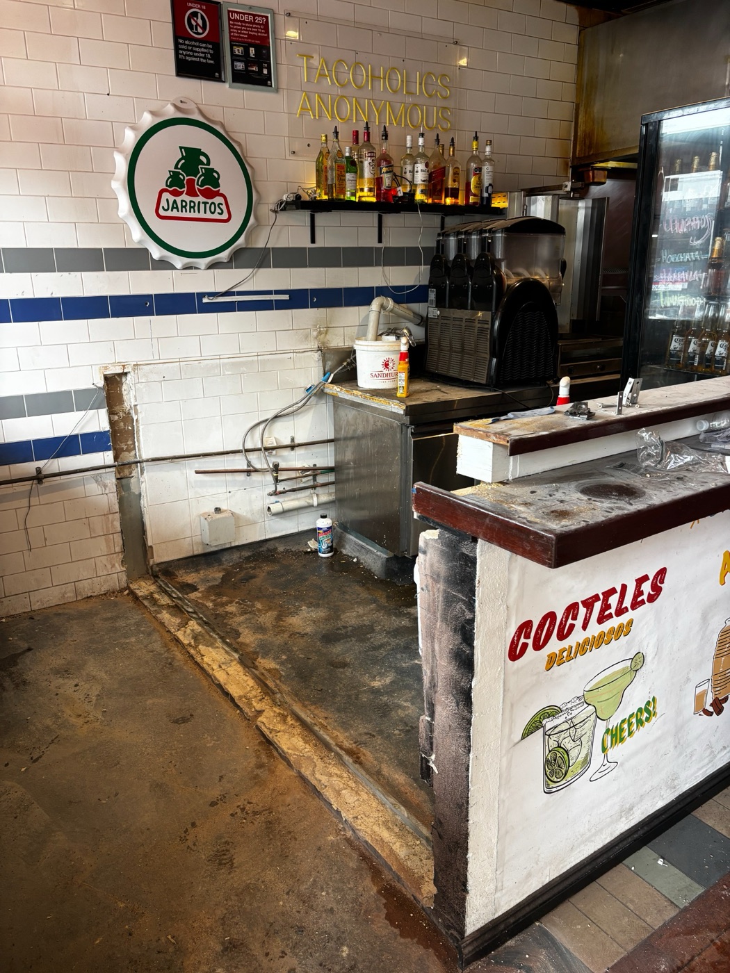 Cleared floor area after removal of the brick wall and sink in Newtown.
