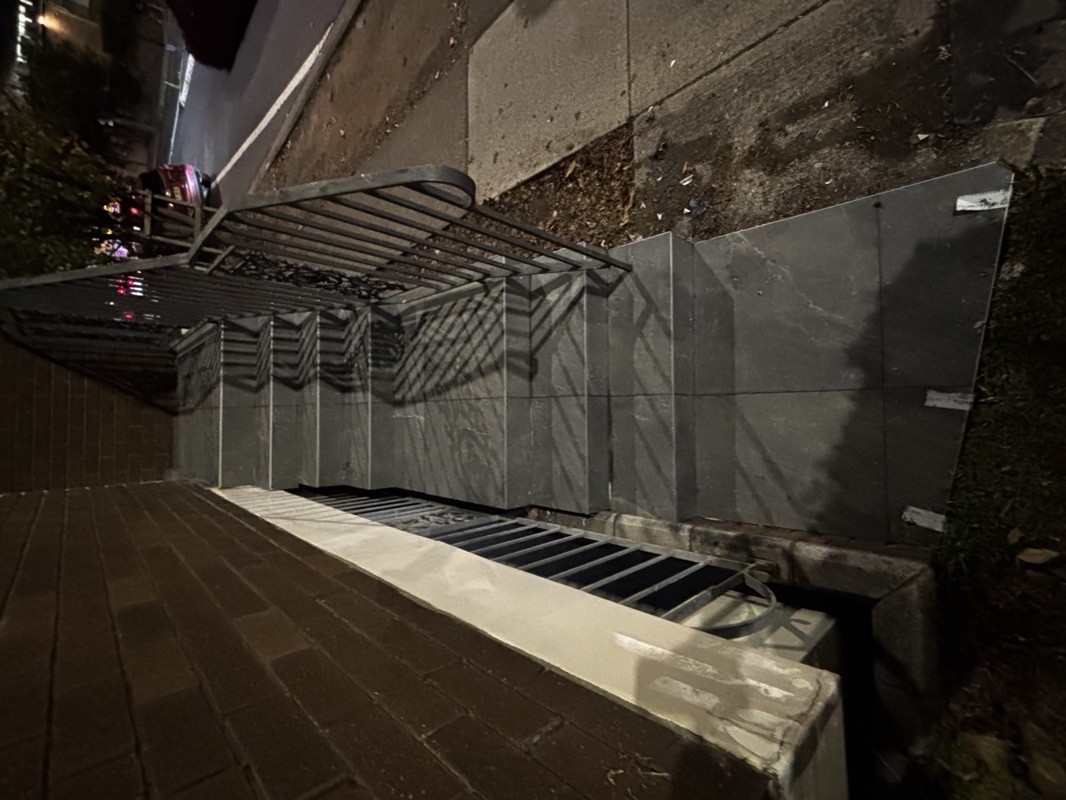 Exterior stairs and landings in Epping after the completed tiling work.