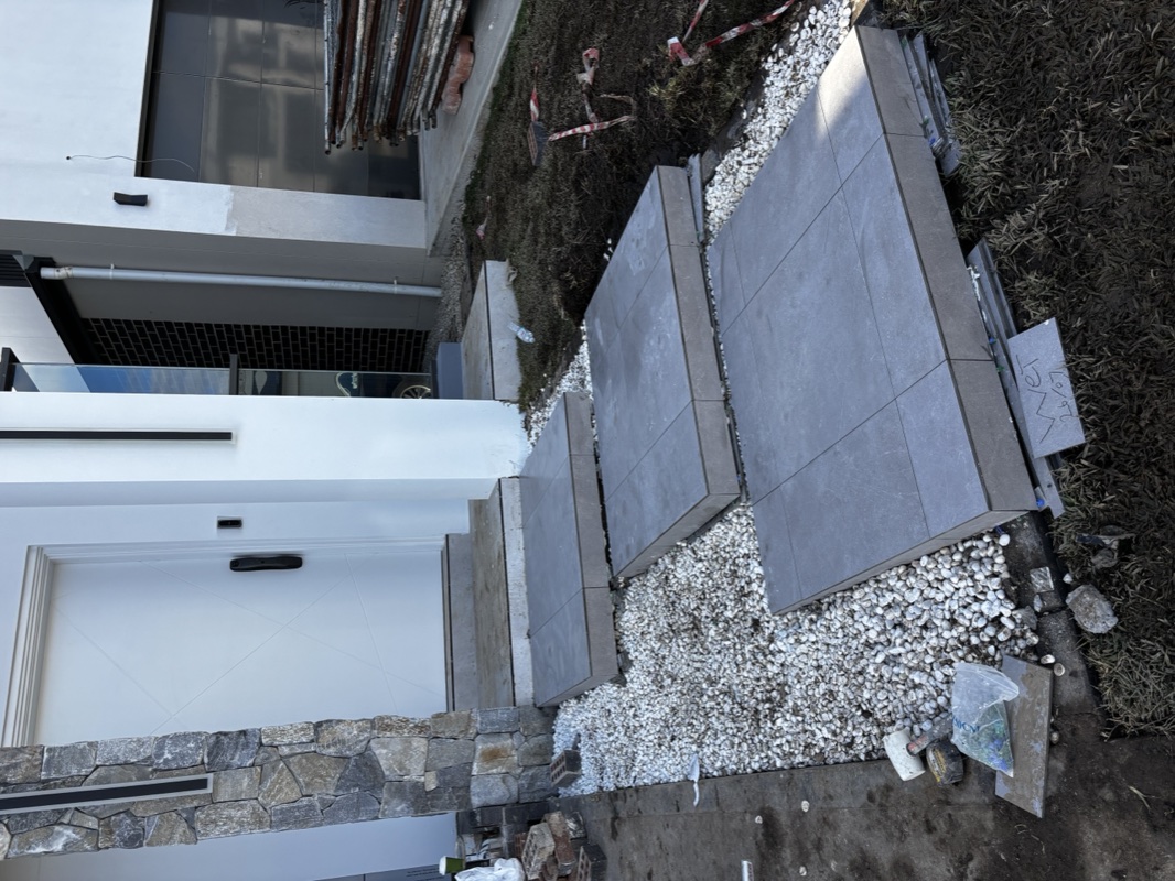 Floating entry stairs in Marsden Park after the completed tiling work.
