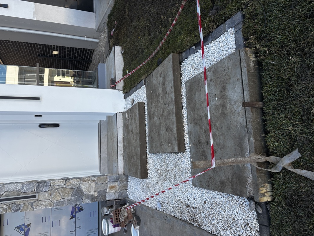 Floating entry stairs in Marsden Park before the completed tiling work.